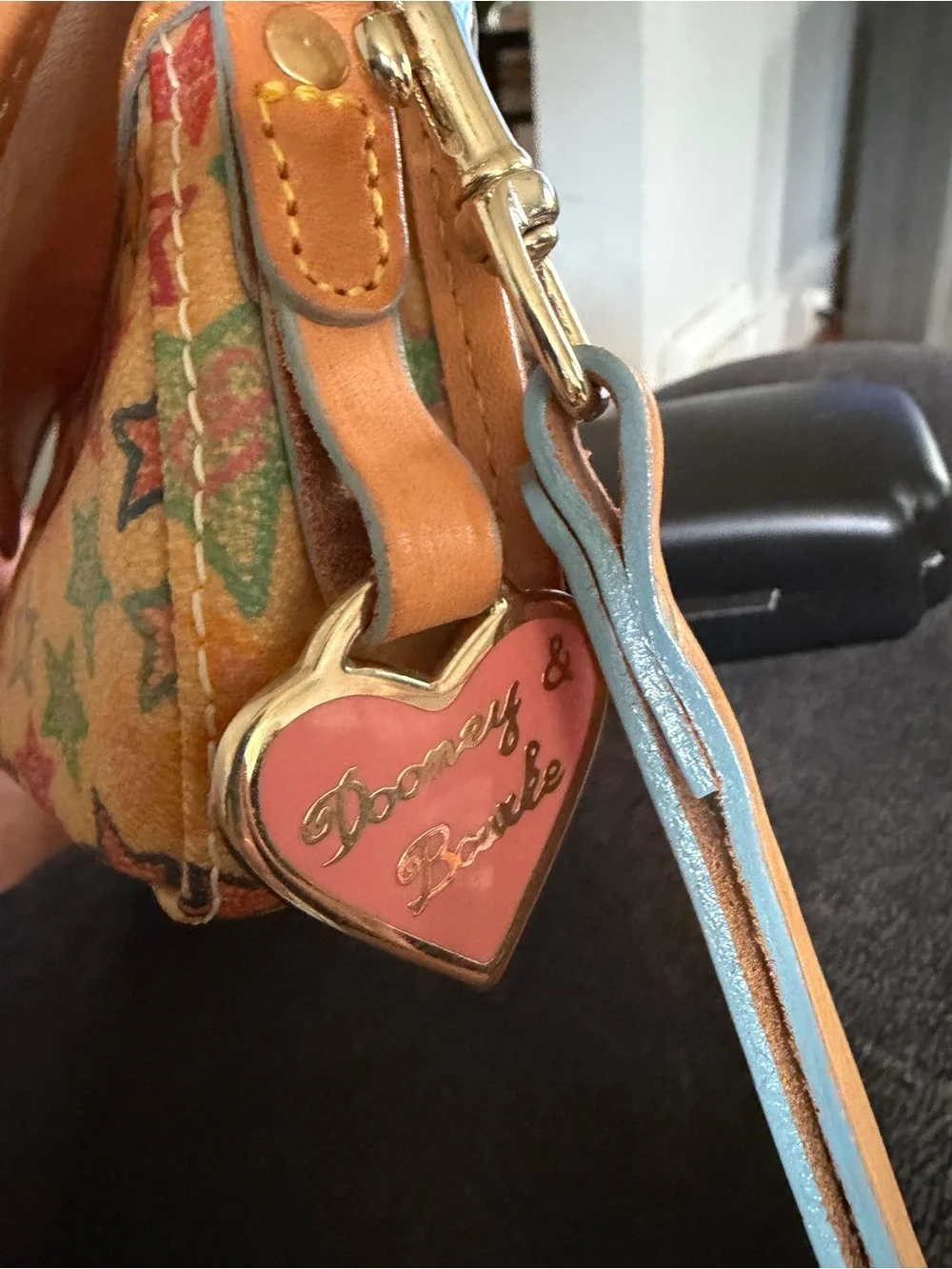 Dooney and Bourke vintage star wristlet